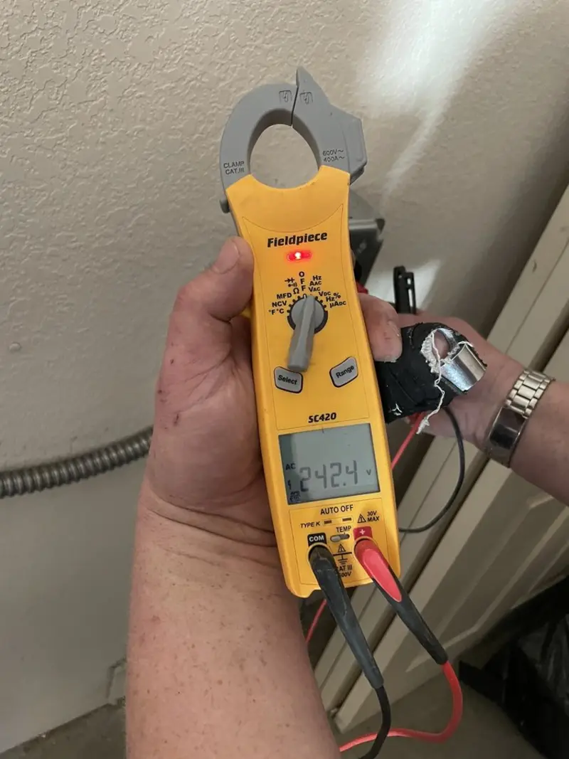 Voltage testing with clamp meter during Aluminum Wiring Replacement in Park City